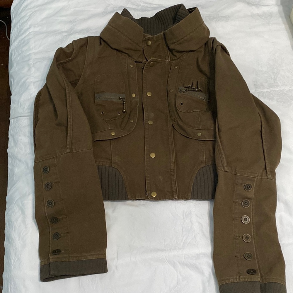 Gently used LONDON Jean zip away jacket that can be modified into a vest